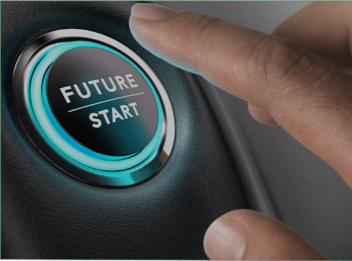 A Button, Similar To A Push-To-Start Button In A Car That Says &Quot;Future. Start&Quot;.