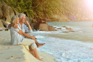 A retired couple on the beach