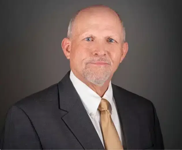 A Headshot Of Bruce Hosler